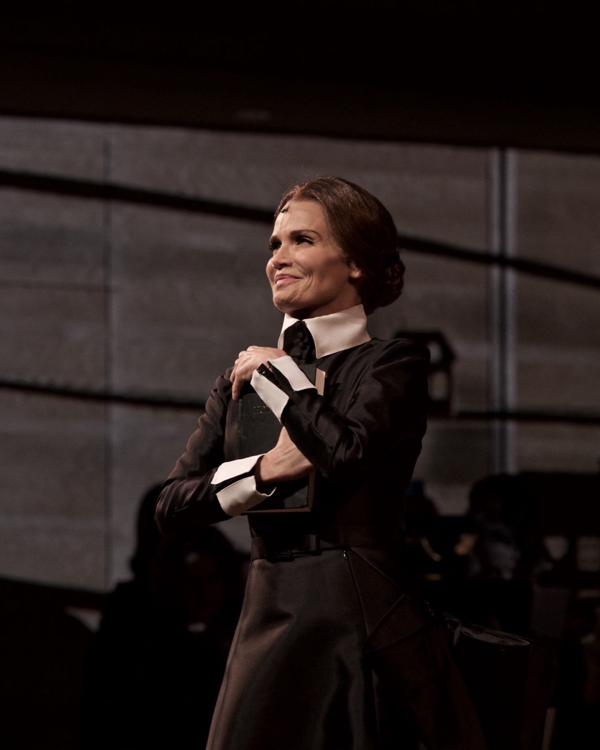 Kristin Chenoweth alone on stage as Anne Hutchinson